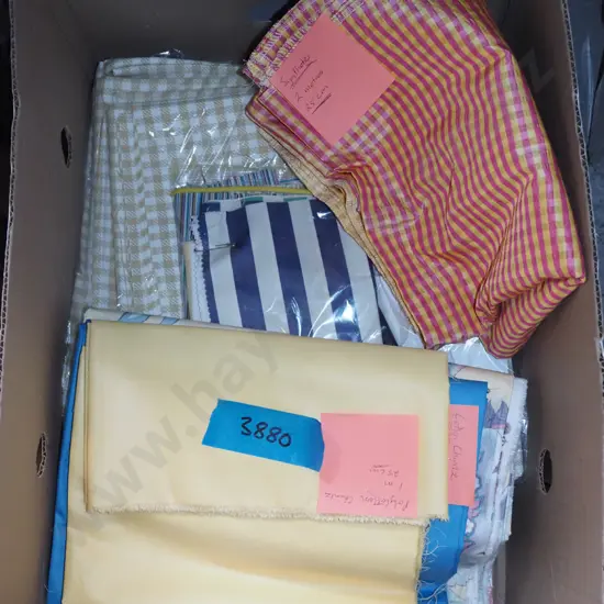 box of fabric pieces