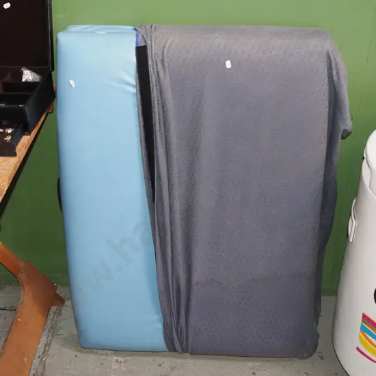 teal vinyl massage table