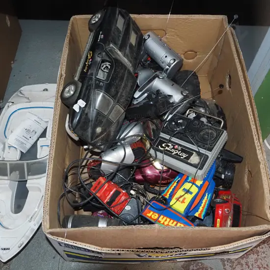box; various remote control vehicles, boat - all As Is No Returns