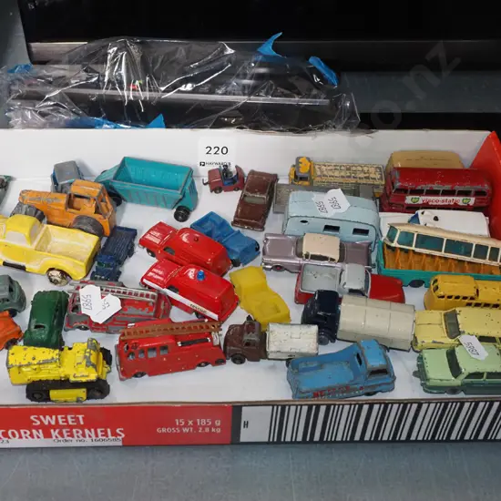 box of toy vehicles