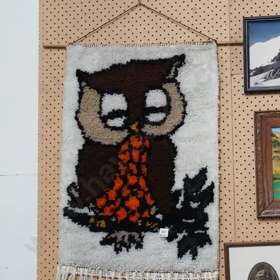 hand tufted owl