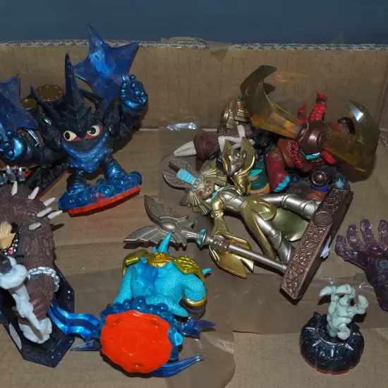 box of fantasy figurines