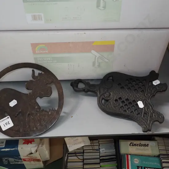 2x cast iron and cast brass pot stands