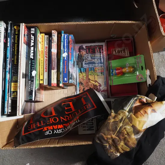 box; sci fi books, Return of the Jedi sticker, Lord of the Rings t-shirt etc