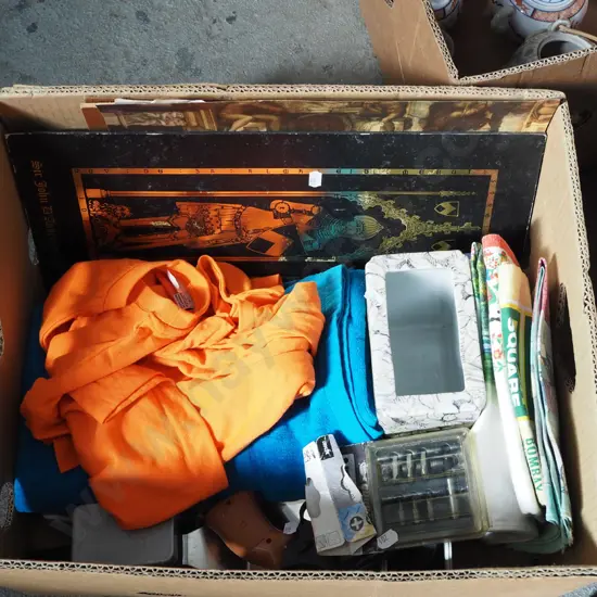 box; plastic toy gun, bbq tool, t shirt etc