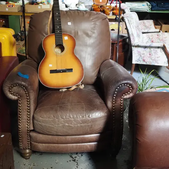 brown leather reclining armchair - has had top section replaced with vinyl