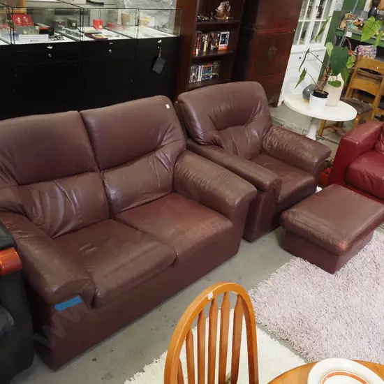 burgundy leather 3 piece lounge suite - 2 seater, single chair, footstool