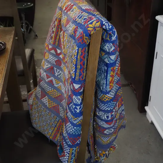 large woven floor mat - slight fading