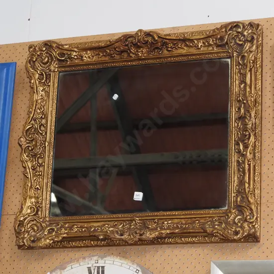 heavily composite gilt framed wall mirror H740 W800