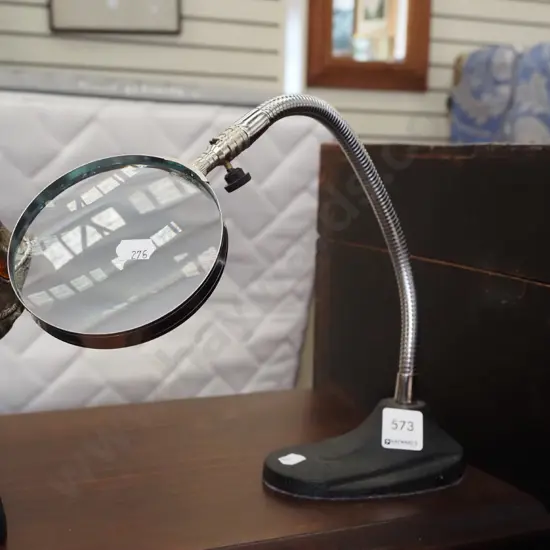 adjustable magnifying glass on stand