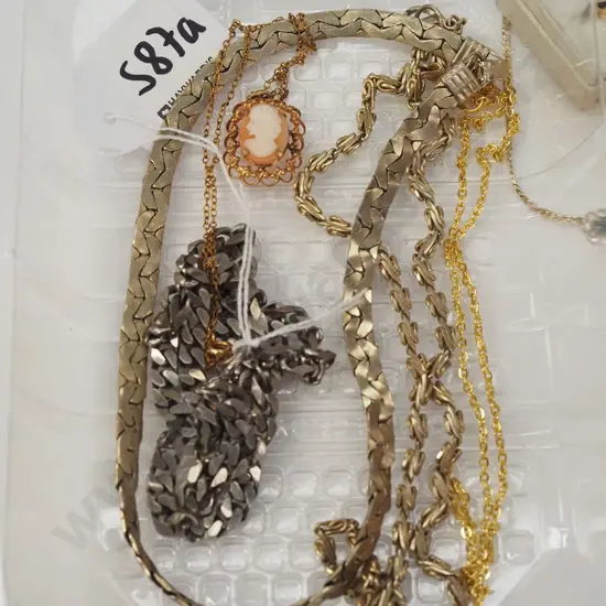tray: cameo pendant & chain, other chains