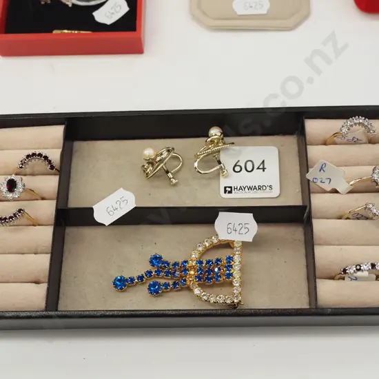 tray  and contents - gold plated rings, clip on earrings, brooch