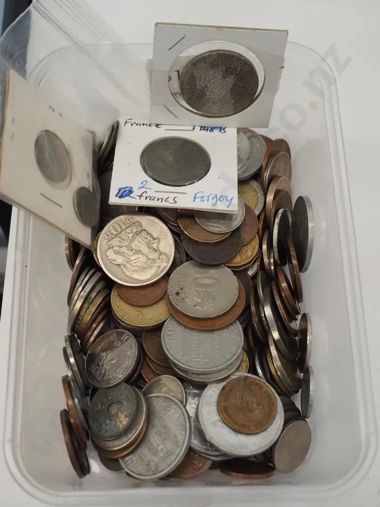 plastic tub of coins Image 1++