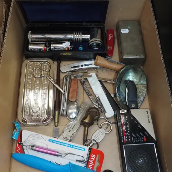 box; rolls razor, corkscrews, pocket knives etc
