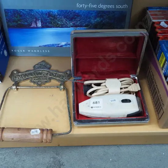 toilet roll holder, early electric razor