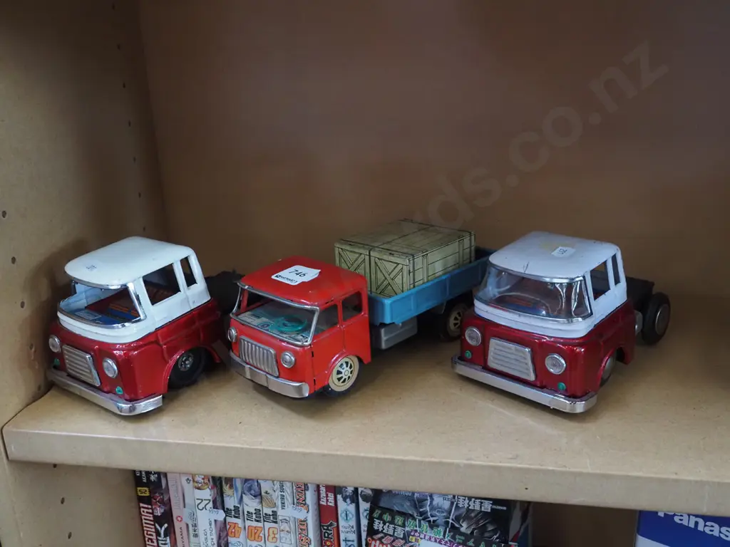 3x tin toy trucks Image 1++