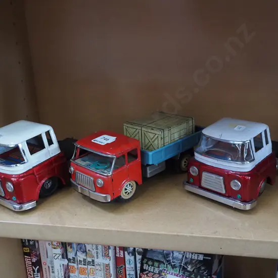 3x tin toy trucks