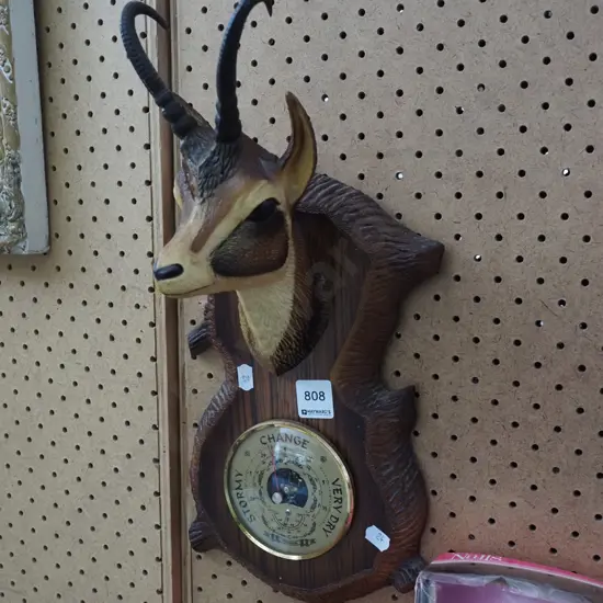 plastic goat themed barometer