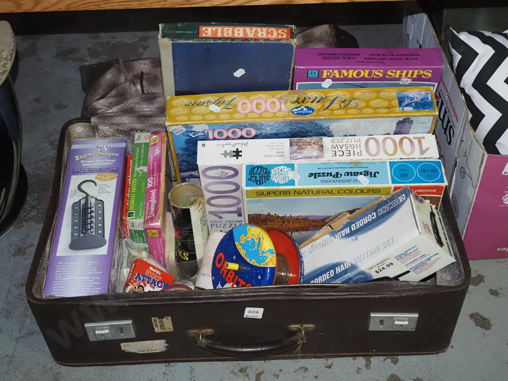 vintage suitcase; puzzles, board games, electric clippers etc Image 1++