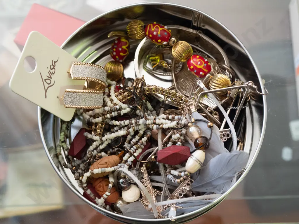 tin of costume jewellery Image 1++