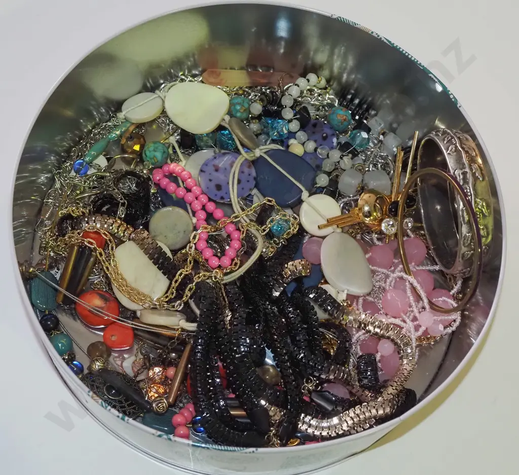 tin of costume jewellery Image 1++