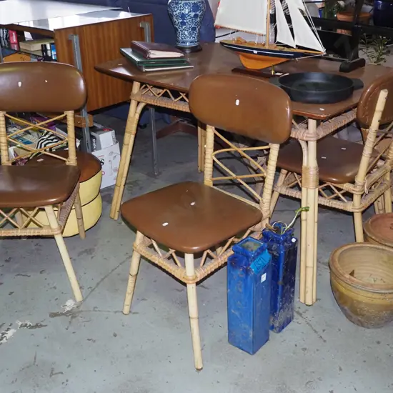 mid century cane bamboo and formica top dining table with 3 brown vinyl chairs