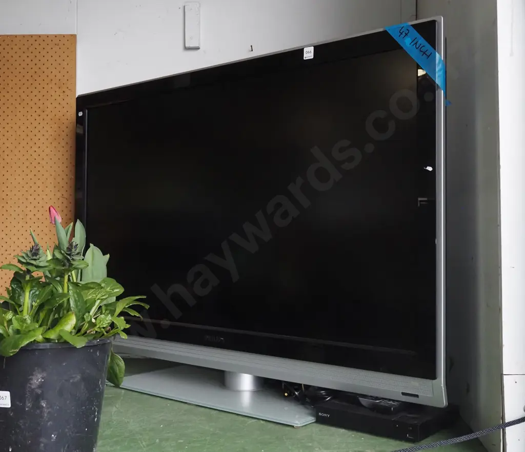 Philips plasma 47" TV with 2 remotes, Sony Netflix set top box Image 1++