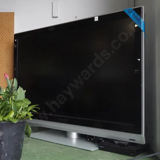 Philips plasma 47" TV with 2 remotes, Sony Netflix set top box