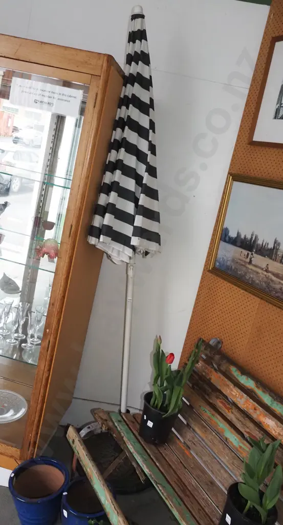 green and white umbrella with stand - umbrella too small for stand Image 1++