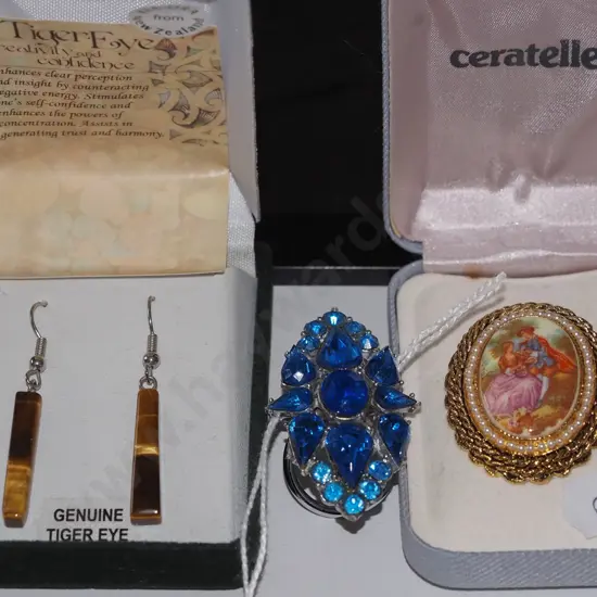 brooch, large blue stone ring, earrings