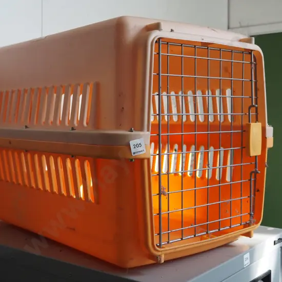 orange plastic pet motel