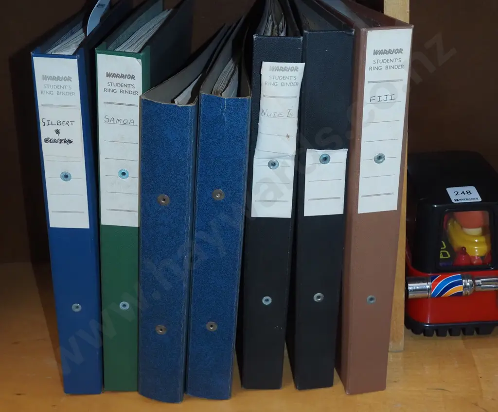 7 binders of stamps Image 1++