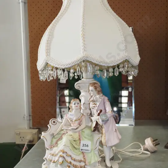 figural romance scene based table lamp H450