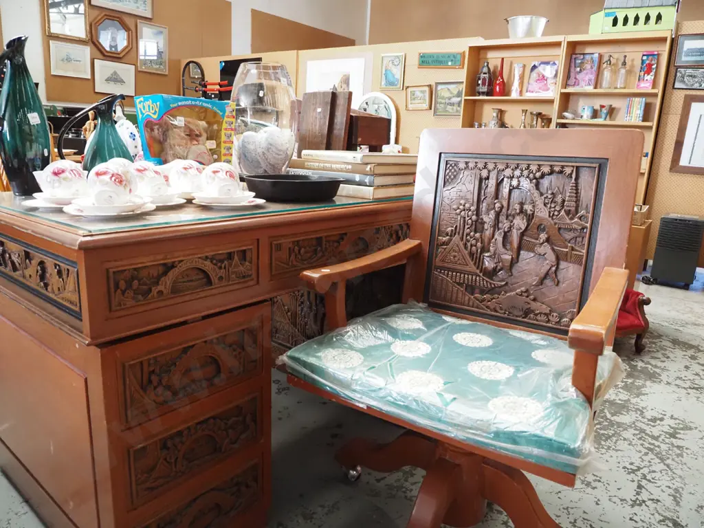 heavily carved hardwood Chinese desk with 6 drawers, 1 door, matching chair - repair to chair Image 1++