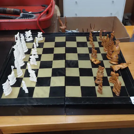 carved wood and chrome chess set