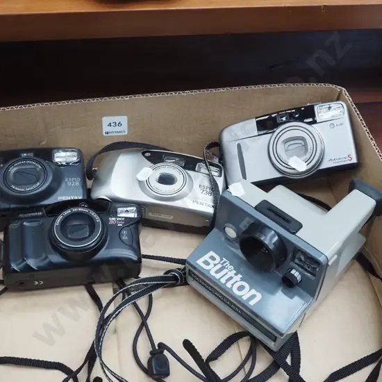 Polaroid land camera, 4x 35mm cameras