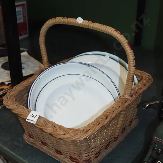 cane basket, enamel plates and bowls