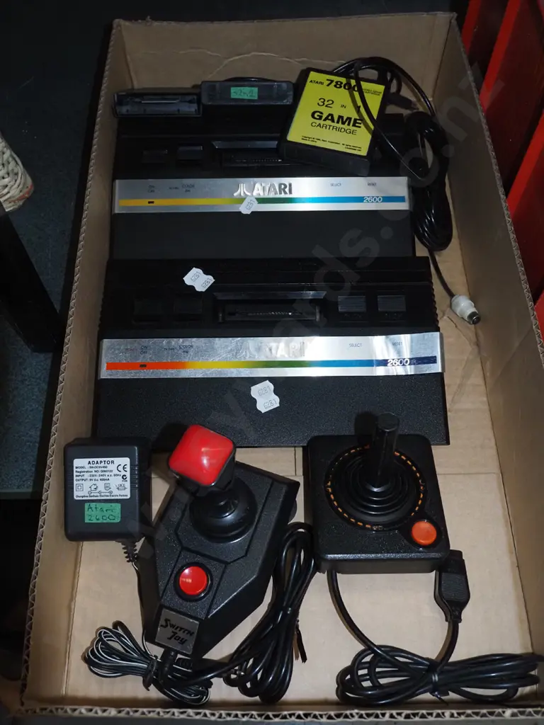 box; 2x Atari games and cartridges,  gaming consoles, joystick Image 1++