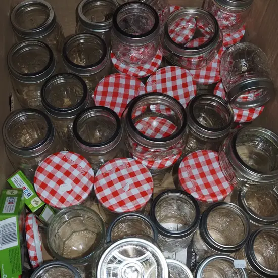 box of preserving jars and lids