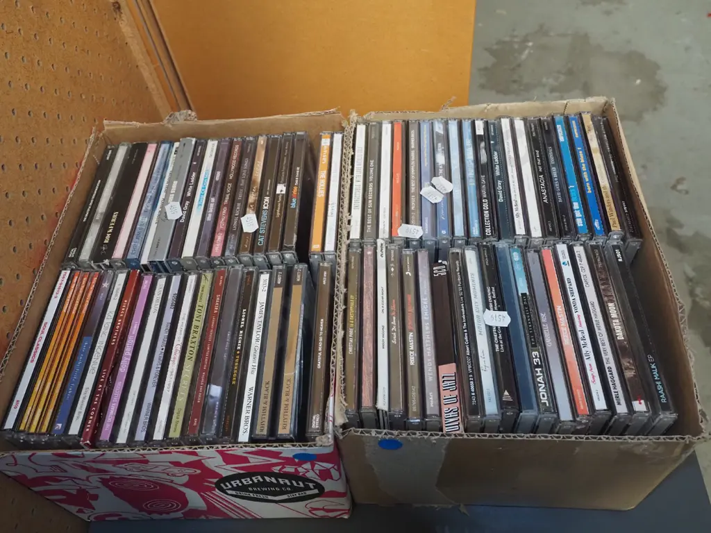 2x boxes of DVDs - blue dots Image 1++