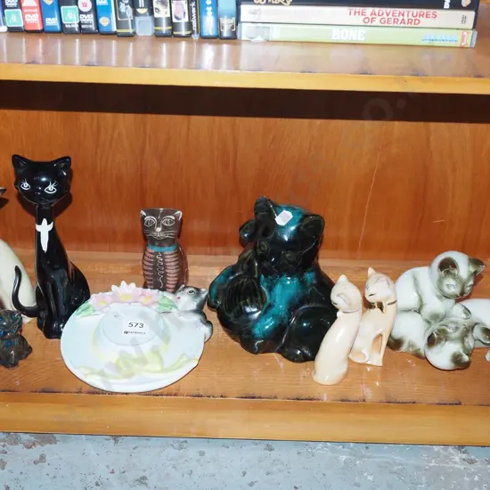 shelf; cat figurines
