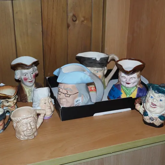 numerous character jugs, some chips / cracks