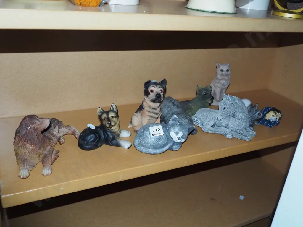 shelf; composite and ceramic animal figurines Image 1++