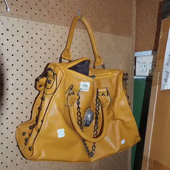  orange vinyl hand bag