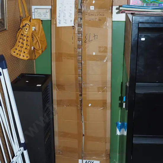 yet to be assembled wooden shelving unit