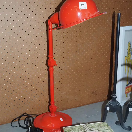 red adjustable desk lamp