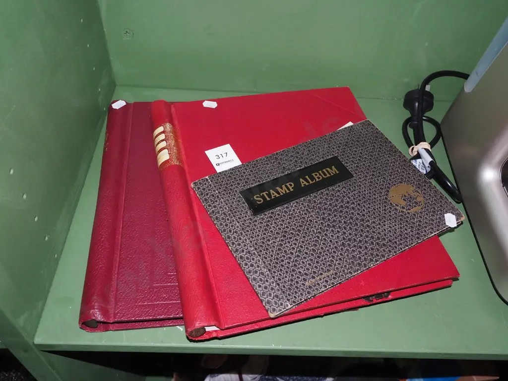 3x stamp albums Image 1++