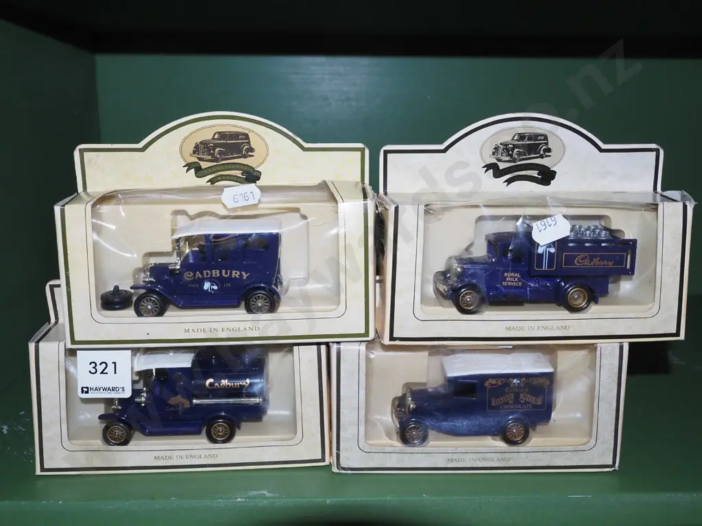 4x boxed Cadbury chocolate model vehicles - damage to boxes Image 1++