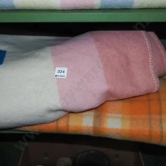 2x woollen blankets - some wear