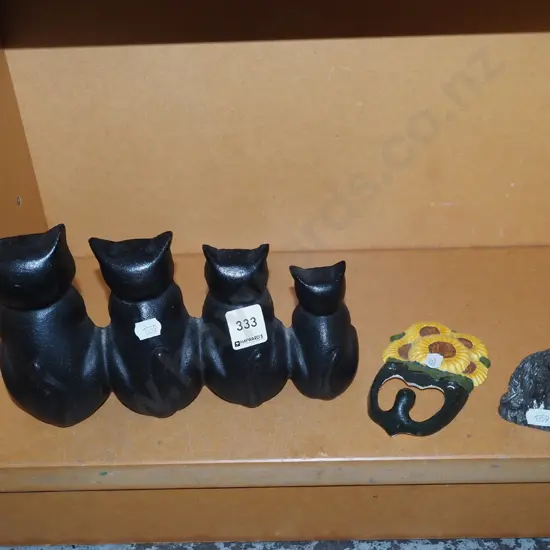 cast iron hat themed door stop, coat hook etc